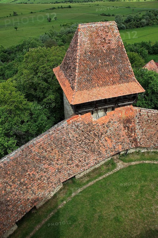 Romania, view from the church tower of the defensive wall and tower of the fortified church of Viscri, German Deutsch-Weisskirch a town in the district of Brasov, Transylvania, UNESCO World Heritage Site