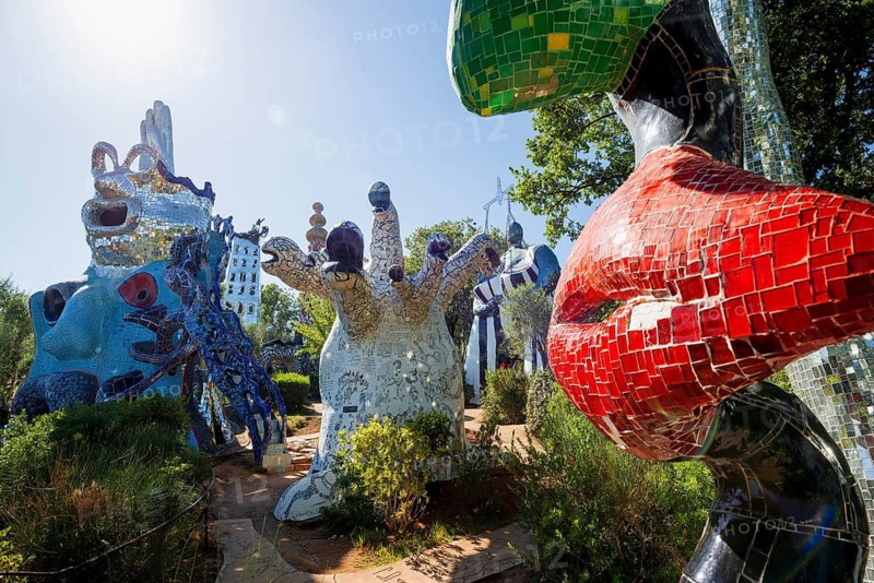 Colourful sculptures made of glass and mirrors, Giardino dei Tarocchi, Garden of Tarot, by Niki de Saint Phalle, near Capalbio, Province of Grosseto, Tuscany, Italy