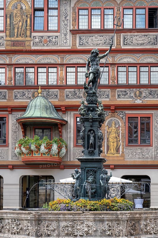Neptune Fountain, also Market Fountain, behind it the façade of the Town Hall, Tübingen, Baden-Württemberg, Germany