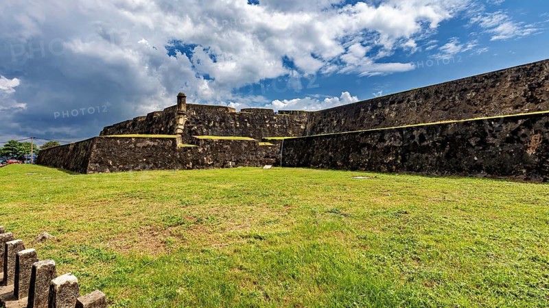 Extensive fortress area with stone walls under blue skies, The fortress of Galle in Sri Lanka