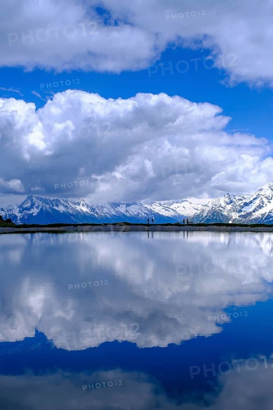 Mountain lake with alpine panorama, snow pond Finkenberg, Penken, Mayrhofen, Zillertal, Tyrol, Austria