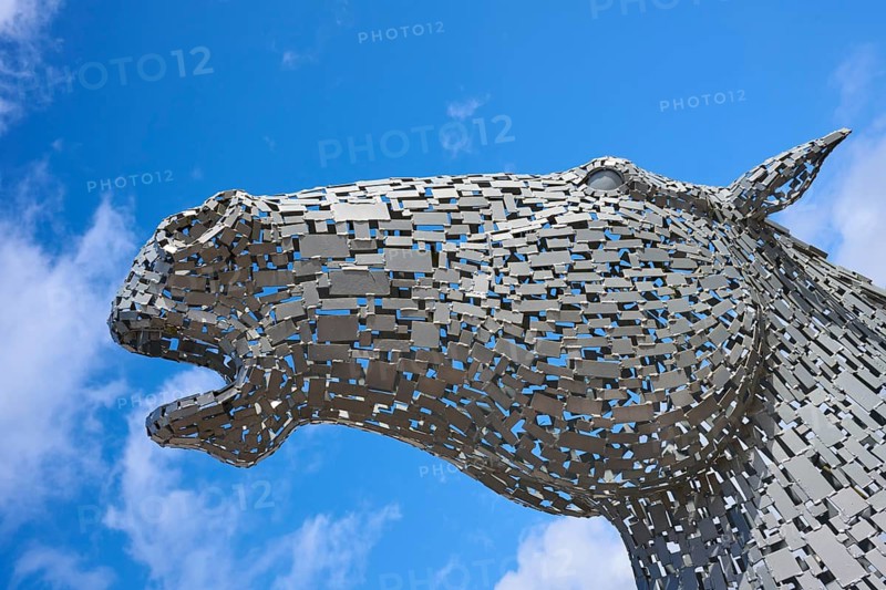 Close-up of an imposing modern metal horse sculpture against a bright blue sky, Ardrishaig, Loch Fyne, Scotland, United Kingdom, Great Britain