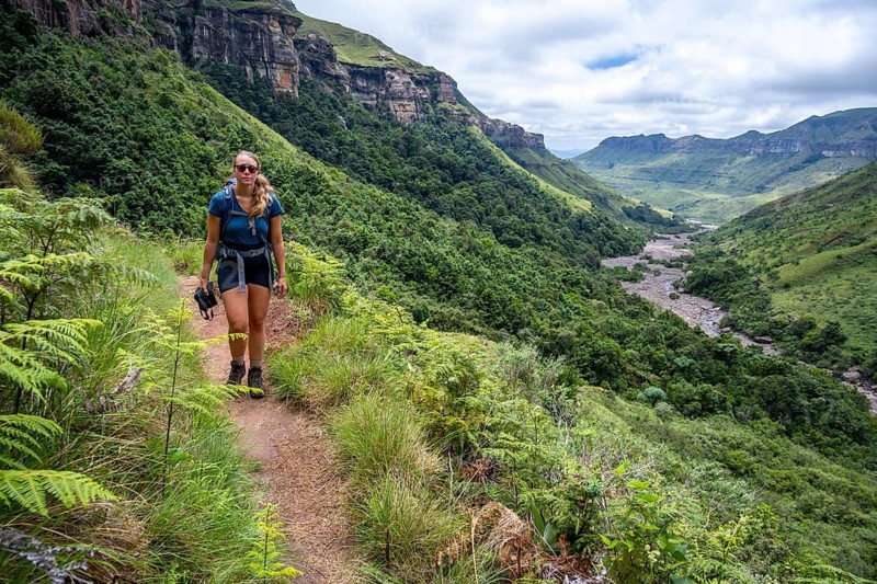 Female hiker on hiking trail, hiking to Tugela Gorge, Drakensberg National Park, KwaZulu Natal, South Africa