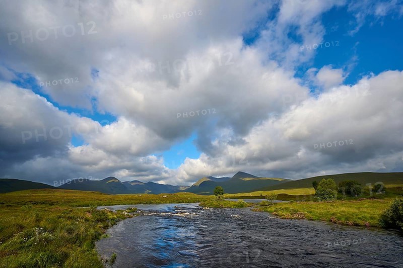 Cloudy sky over river and hills in natural setting, Rannoch Moor, Bridge of Orchy, Scotland, United Kingdom, Great Britain