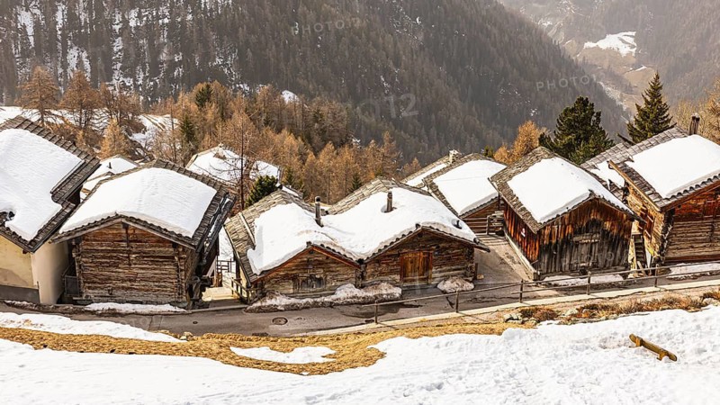 Snow-covered old farmhouses, historic town center, Chandolin, Val d'Anniviers, Valais Alps, Canton of Valais, Switzerland