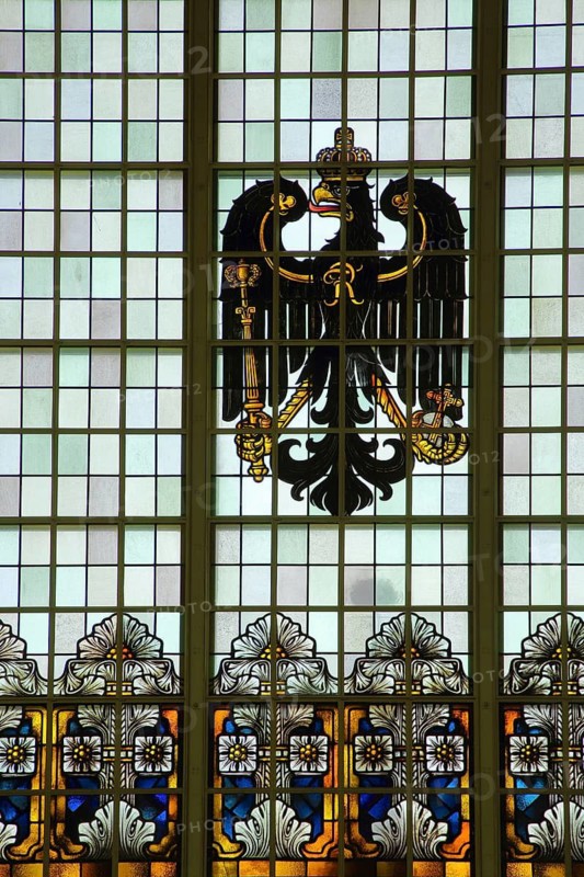 Stained glass window with German imperial eagle and floral decorations, national coat of arms, crown, black, arts and crafts, stained glass, interior view, vestibule, railway station, Bad Homburg, Taunus, Hesse, Germany