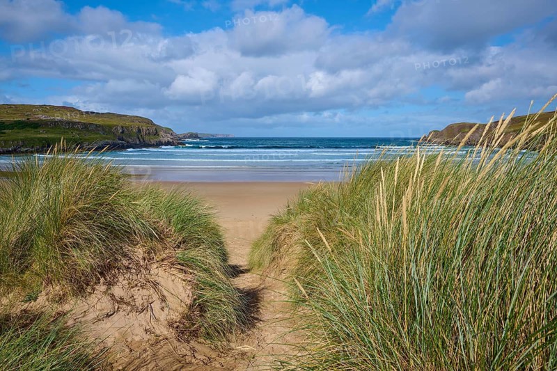 A sandy path leads through the dunes to a wide, wavy beach, Farr Bay, Bettyhill, Thurso, Scotland, United Kingdom, Great Britain