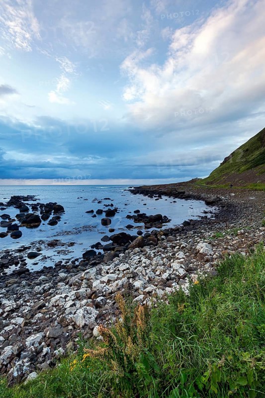 Rocky coast, coastline, dusk by the sea, Giant's Causeway, Giants Causeway on the horizon, Causeway Coastal Route, Antrim, Northern Ireland, Great Britain