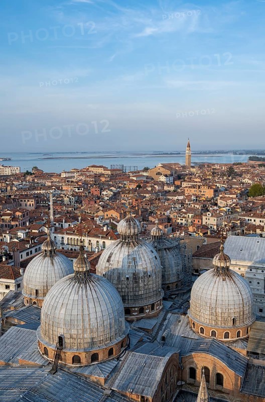 View over the roofs of Venice with the domes of St Mark's Basilica in the evening light, view from the Campanile di San Marco bell tower, city view of Venice, Veneto, Italy