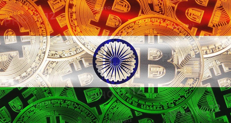 Bitcoins on India flag background. Golden bitcoin coins on India flag background
