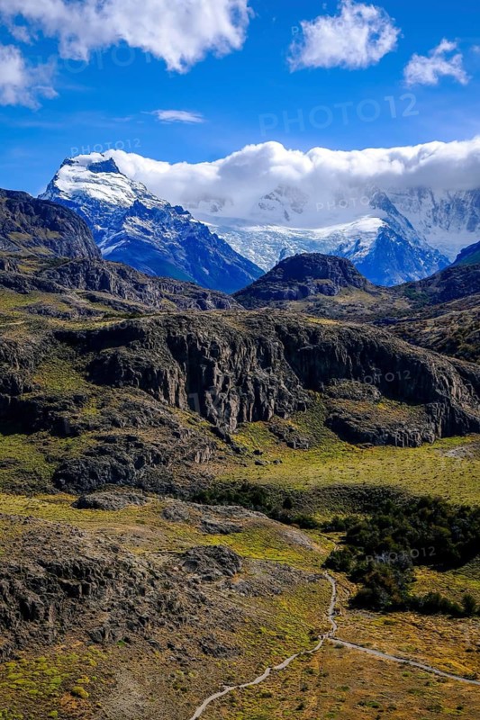 El Chaltén, Patagonia, Argentina, El Chaltén with a view of the Fitz Roy massif. El Chaltén offers the most direct access to the mountain massifs of Cerro Torre and Fitz Roy. The trekking resort is located 222 kilometres north of El Calafate, on the border with Chile