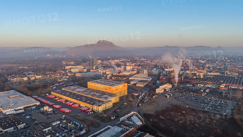 Aerial view, panorama of the industrial area of the city of Singen am Hohentwiel, after sunrise, the Hegauberge Mountains on the horizon, Konstanz district, Baden-Württemberg, Germany