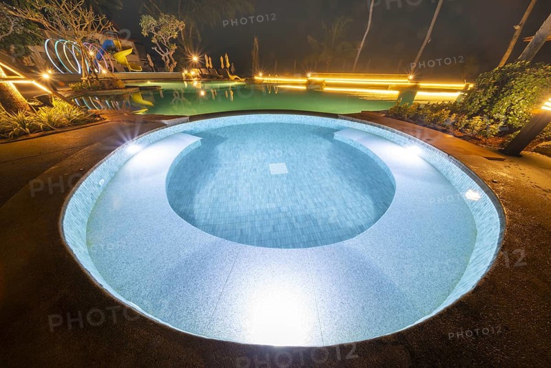 Illuminated swimming pool on Koh Chang Island, Andaman Sea, Southern Thailand, Thailand
