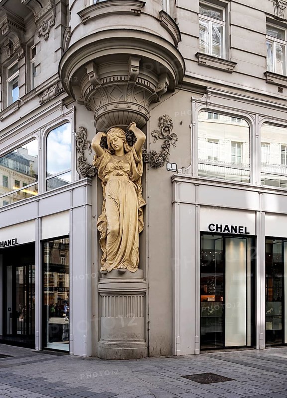Sculpture on a baroque façade of a historic building, Vienna, Austria