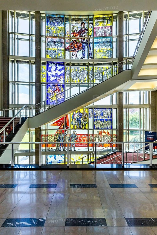 Stained glass window depictions from the history of the German labor movement by Walter Womacka in the stairwell of the former State Council building, Mitte, Berlin, Germany