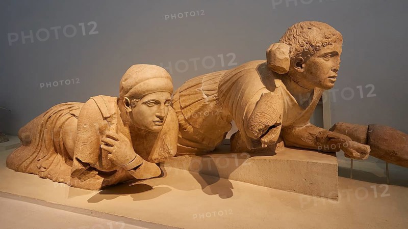 Two lapith women lying in the left corner of the west gable of the temple of Zeus, battle between lapiths and centaurs, two ancient marble busts lying in a museum, depicting classical works of art, Olympia Archaeological Museum, Ancient Olympia, Olympia, Peloponnese, Greece