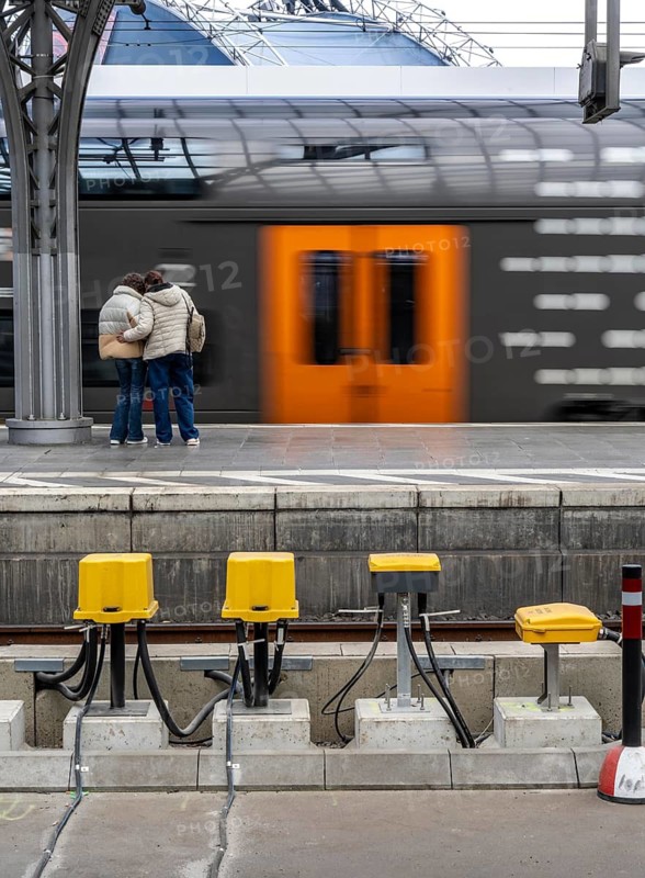 Digitalisation at Deutsche Bahn, in the yellow cable protection and distribution boxes the data cables from various sensors, such as axle counters, signals, points, RFID recording devices, etc., converge on the tracks, from here they are sent to the digital interlocking technology to record data for controlling rail traffic, Cologne, North Rhine-Westphalia, Germany