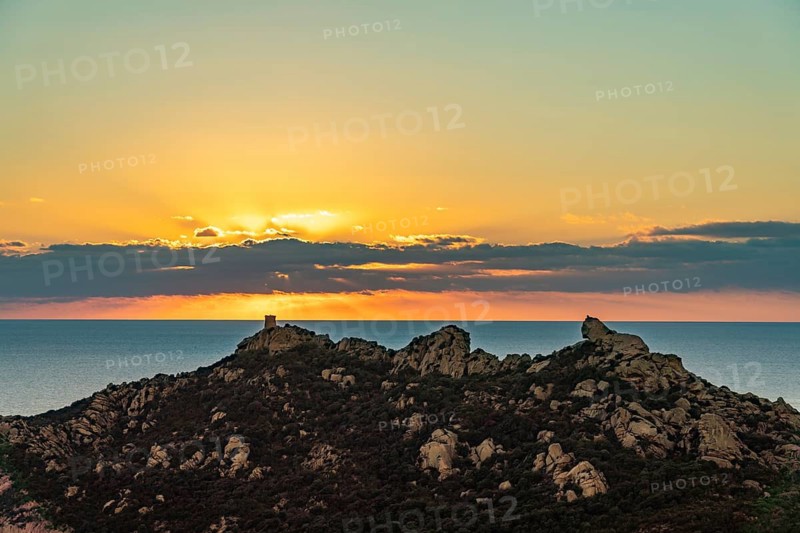 Sunset at the Genoese Tower of Roccapina in southwestern Corsica, France