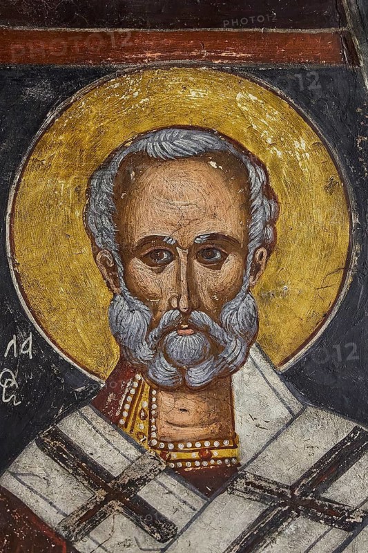 Agios Nikolaos, portrait of a saint with halo, golden tones are dominant in the depiction, Easter 2025, Church of the Dormition of the All-Holy God Bear, Kimisis tis Theotokou, Asklipio, Rhodes, Dodecanese, Greek Islands, Greece