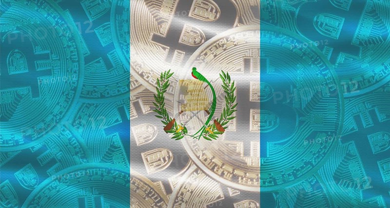 Bitcoin coins on Guatemala flag background. Golden bitcoin coins on Guatemala flag background