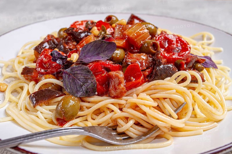 Spaghetti with Sicilian caponata, vegetable stew, Italian cuisine, homemade, no people