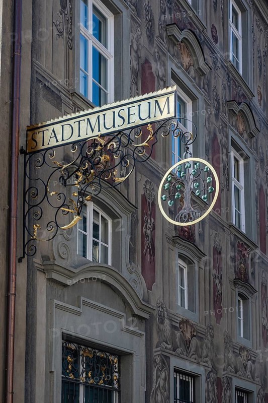 Detailed view, façade painting from Haus zum Cavazzen with artfully decorated nose sign with the inscription City Museum in the old town of Lindau, Bavaria, Germany