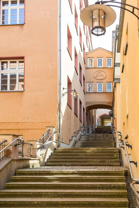Archway at the New Town Hall with stairs at the portico, the passageway to the AltmarktLichtenstein, Saxony, Germany