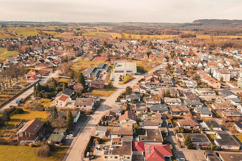 Suburban view with modern houses and good road infrastructure in rural surroundings, Ötisheim, Enzkreis, Germany