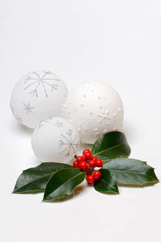 Holly branch and Christmas baubles