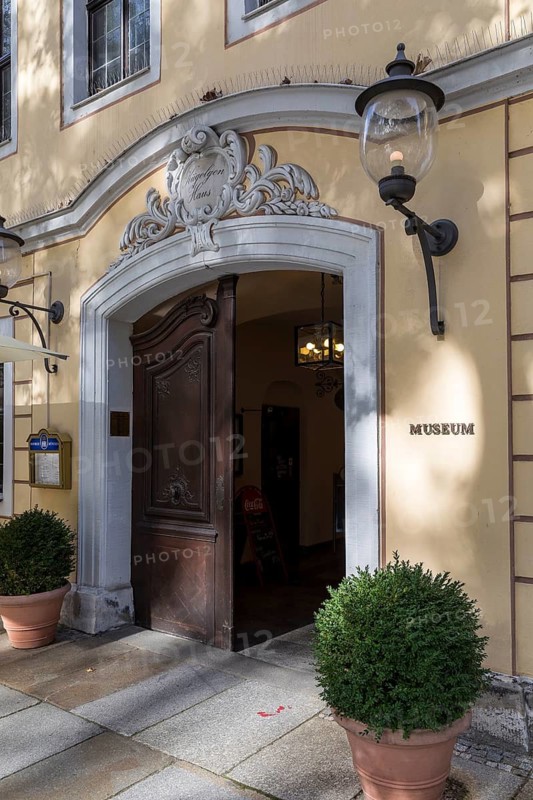 Portal with baroque decoration as the entrance to the Kügelgen Museum on the main street in Dresden, Saxony, Germany