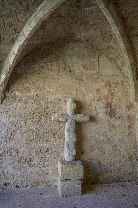 Stone cross and frescoes, Gellone Abbey, also Saint-Guilhem-le-Désert Monastery, Département Hérault, France