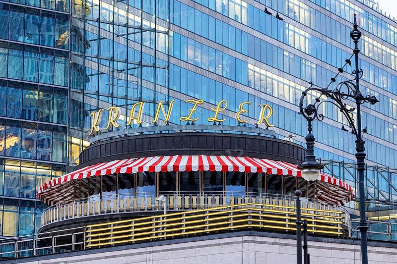 City view of Berlin. Café Kranzler on Kurfürstendamm. Distinctive exterior view with logo. Berlin, Germany