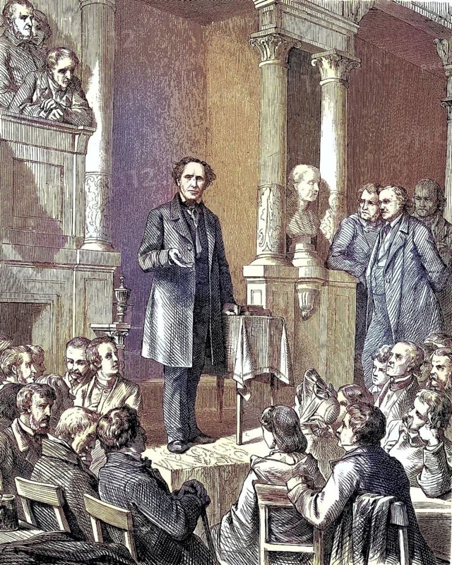 Ludwig Würkert in front of his congregation. Friedrich Ludwig Würkert, 1800, 1876, was a Protestant pastor, writer and revolutionary, coloured woodcut from 1864, man giving a lecture to an audience in a room with columns. Audience concentrated, serious atmosphere