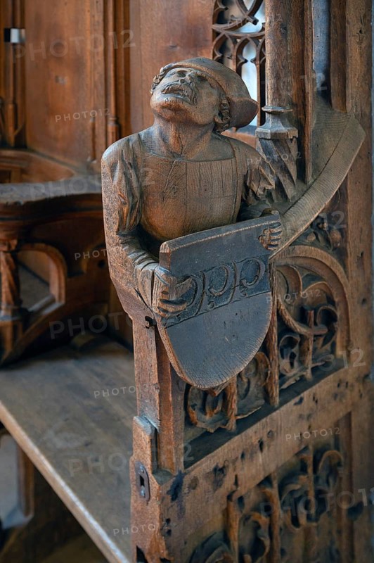 Figure on the late Gothic choir stalls from 1507, St Martin, Memmingen, Bavaria, Germany