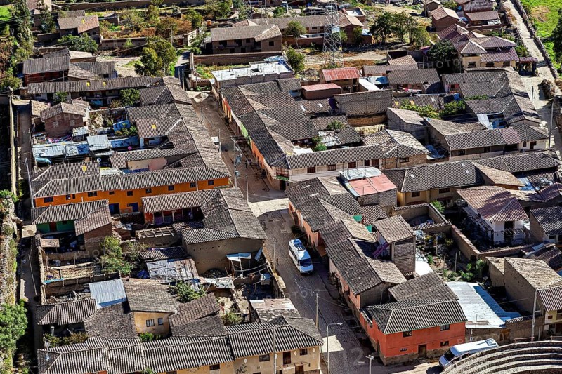 Densely built area with traditional houses and narrow streets in a village, the town of Ollantaytambo in the Andes of Peru