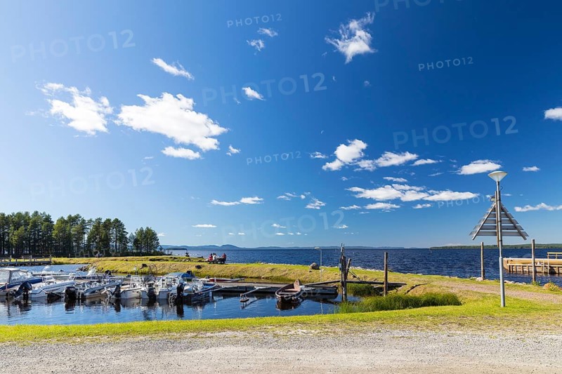 Small harbor with pleasure boats on the shores of Lake Siljan near Tällberg, Dalarnas län, Sweden