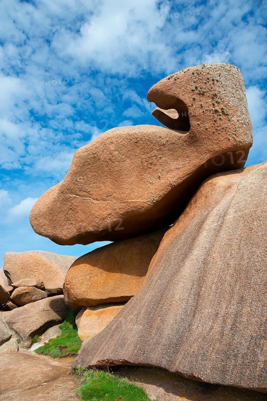 Majestic rocks with small clouds in the background, dramatic view, Ploumanac'h, Ploumanach, Perros-Guirec, Côtes-d'Armor, Brittany, France