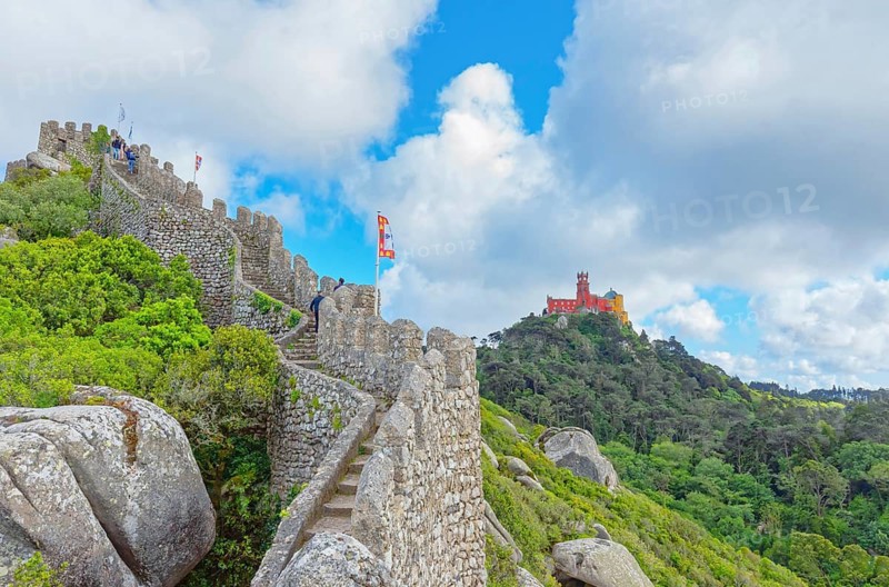View of Castelo dos Mouros and Pena Palace in the distance, Sintra, Portugal