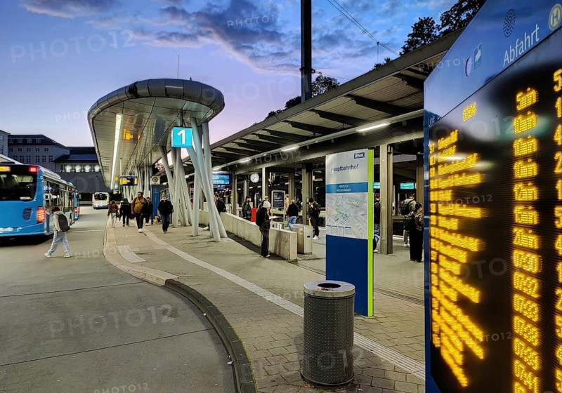 Bus station in the early morning right next to Wuppertal main station, public transport connection, North Rhine-Westphalia, Germany