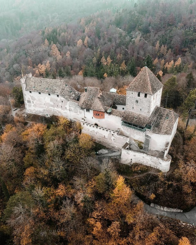 Aerial view of Hohenklingen Castle above Stein am Rhein on a foggy autumn day, Canton Schaffhausen, Switzerland