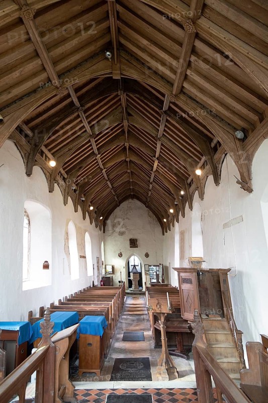 Pews in nave of church of Ilketshall St Andrew, Suffolk, England, UK