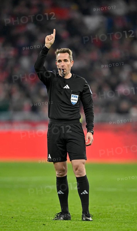 Referee Tobias Stieler gesture index finger raised soccer Bundesliga, Allianz Arena, Munich, Bayern, Germany