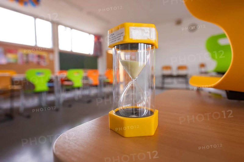 A quiet room with an hourglass on a table in a classroom, homework supervision, Schlehengäu Grund Schule Gechingen, Calw district, Germany