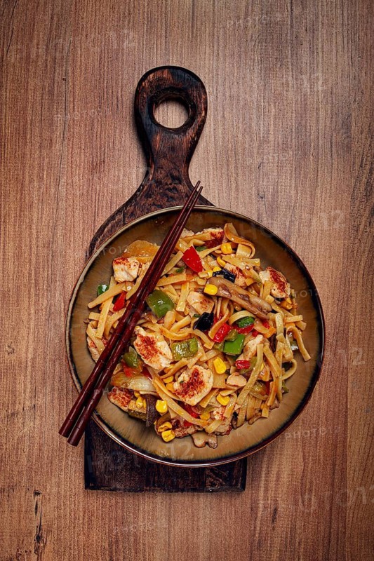 Fried noodles with chicken meat and vegetables, Bami Goreng, Indonesian dish, no people