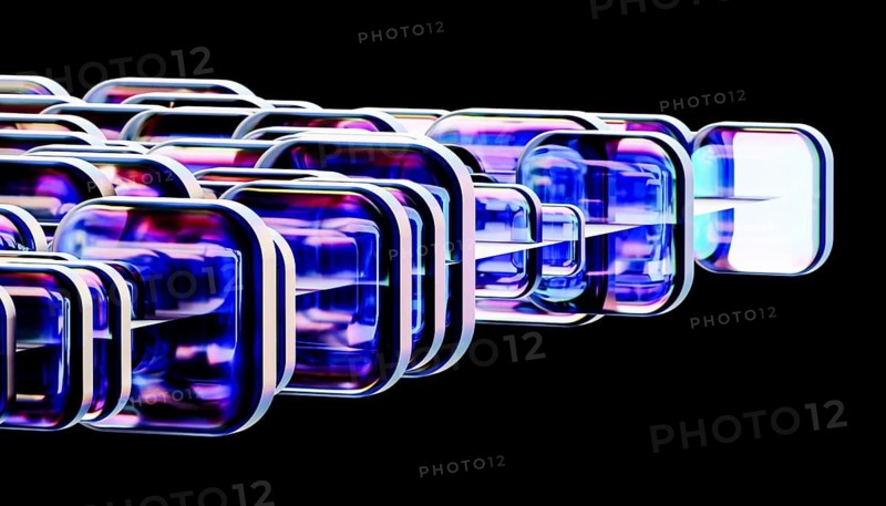 A captivating array of translucent glass shapes in vibrant blue and purple hues against a black background. The futuristic design and symmetry evoke a sense of innovation
