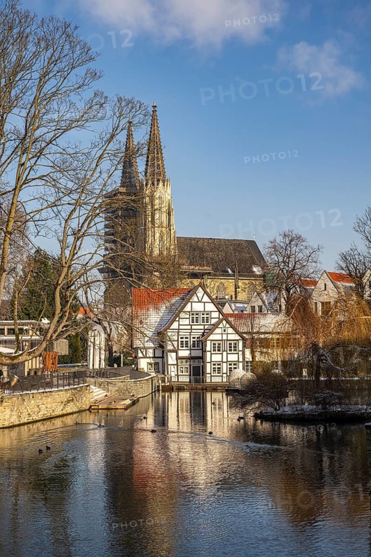 Large pond, meadow church and pond mill in Soest, North Rhine-Westphalia, Germany