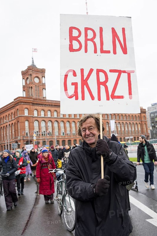 A participant holds a sign BRLN GKRZT at the #unkürzbar! Demonstration against the Berlin Senate's austerity plans, Berlin, 15.12.2024. The Senate plans to cut around 10% of Berlin's 2025 budget, including in the areas of culture, education, transport and climate protection