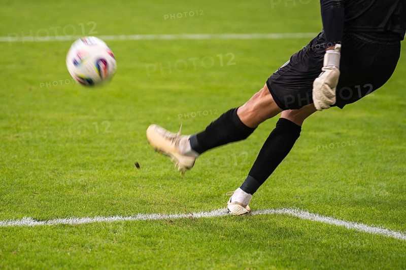Goalkeeper kicks the ball during the soccer match in Lubin, Poland