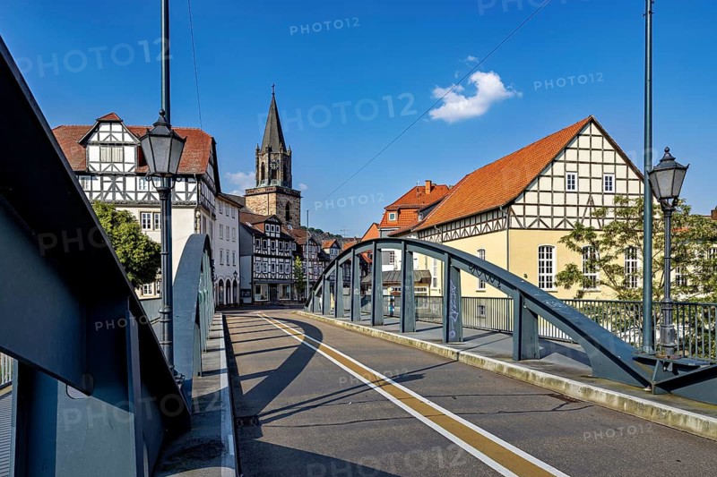 Town view with bridge, half-timbered houses and church in fine weather, The town of Rotenburg an der Fulda