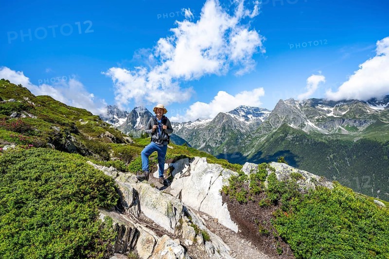 Mountaineers on a hiking trail with mountain views, hiking to the Aiguillette des Posettes, Chamonix, Haute-Savoie, France
